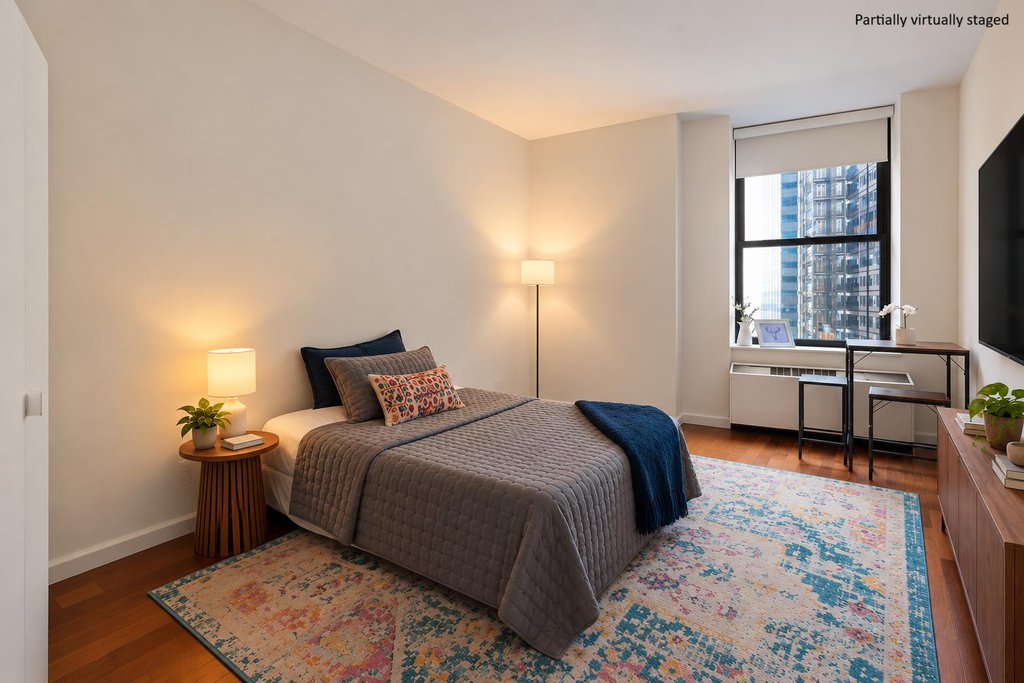 1 Wall Street Court, Unit 1003